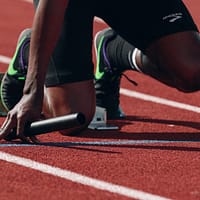 athletes man on running field