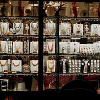 jewelry business brown wooden shelf with assorted items