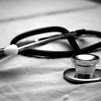 healthcare sector black and gray stethoscope