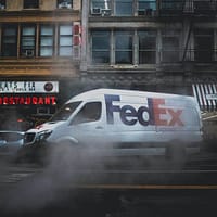 FedEx white and black car