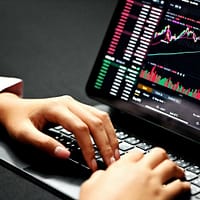 price action trading person using black laptop computer