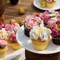 pink and white flower bouquet on white ceramic plate