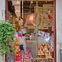 red wooden framed glass window