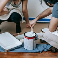 Man Mixing Paint In A Can