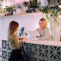 woman facing on white counter