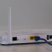 white router on white table