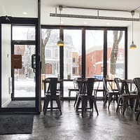 chairs beside tables inside restaurant