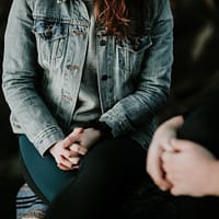 woman wearing gray jacket