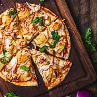 pizza on chopping board