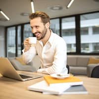 man sitting with a cup- Standard Operating Procedure