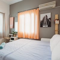 white bedspread inside room