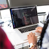 woman using MacBook