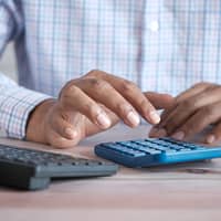 person using black computer keyboard