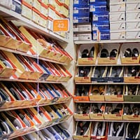 assorted pairs of shoes on boxes