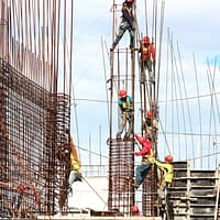 people working on a building