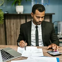 man in black suit