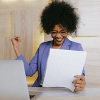 woman holding a paper