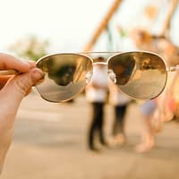 selective focus photography of sunglasses