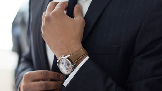 employment attorney man wearing watch with black suit