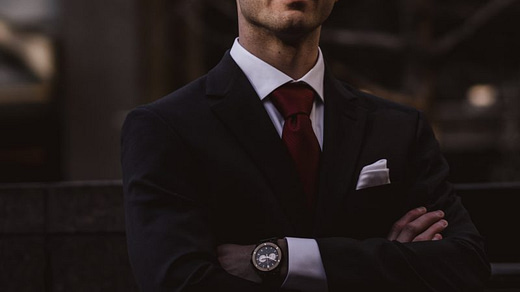 white collar crime man wearing black notched lapel suit jacket in focus photography