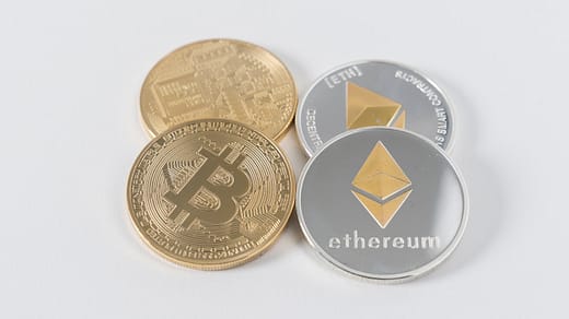 bitcoin ethereum four round silver-colored and gold-colored Bitcoins