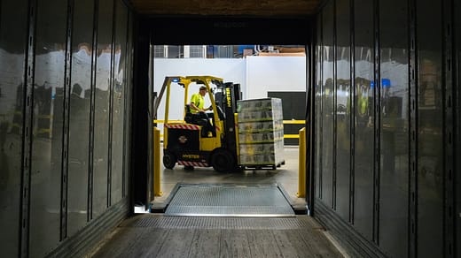 forklift man carrying box using fork liftr