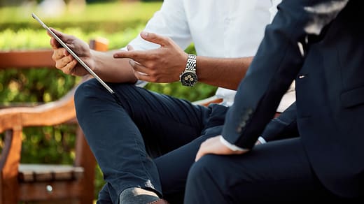 two people sitting during day