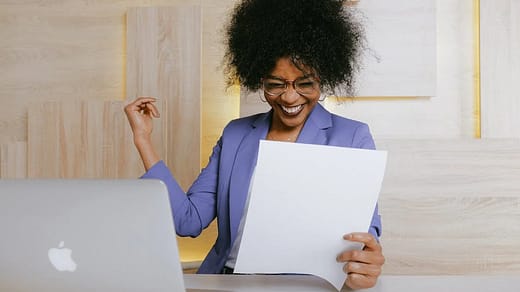 woman holding a paper