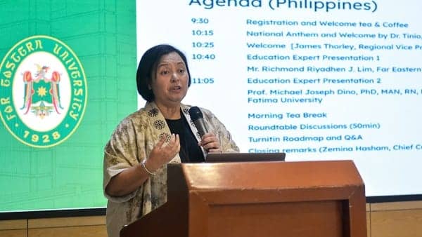 Dr. Maria Teresa Trinidad P. Tinio, FEU Senior Vice President for Academic Affairs, welcomes the speakers and guests during the Turnitin Roadshow forum.